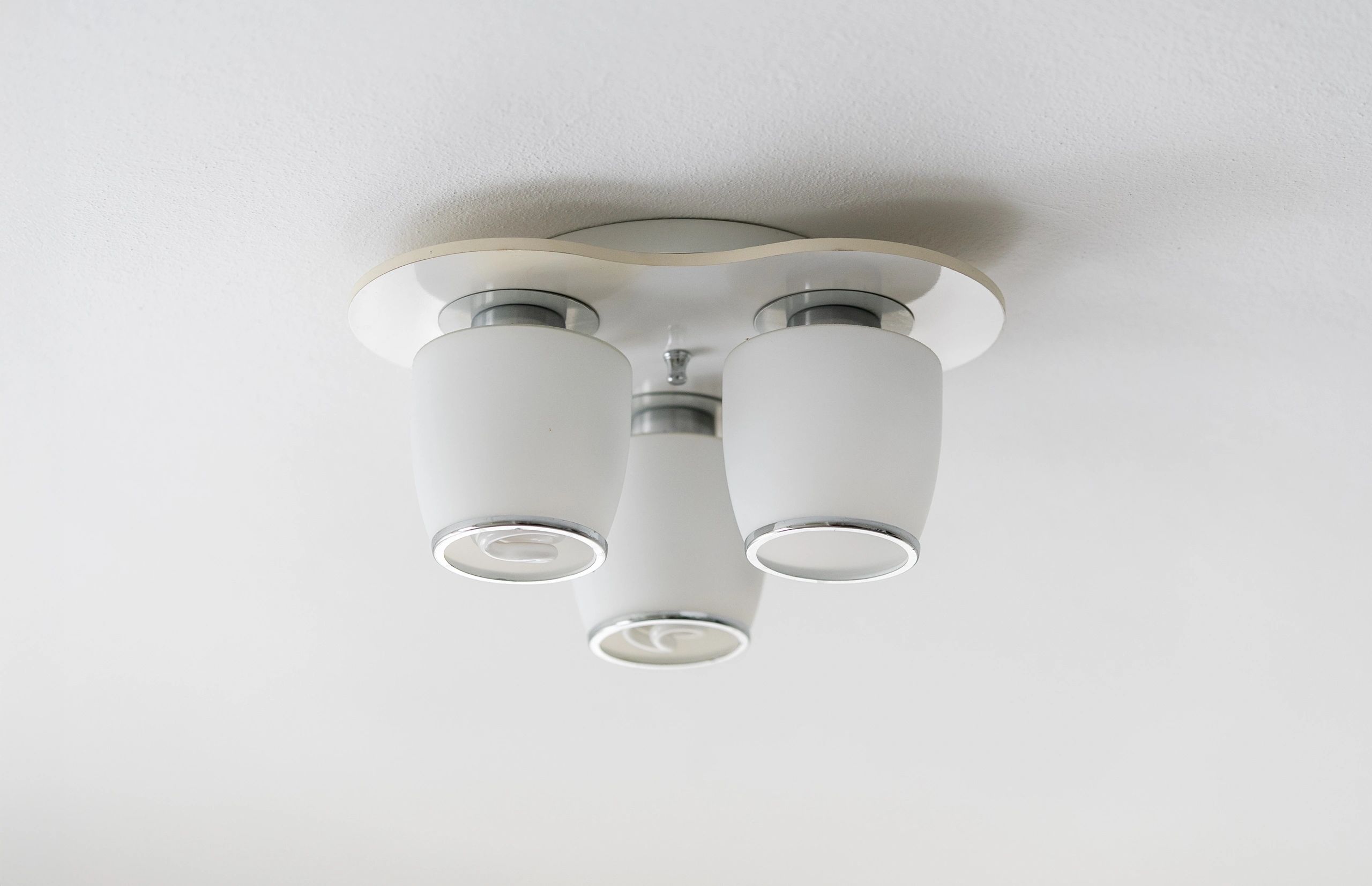 Modern ceiling light fixture with three bulbs